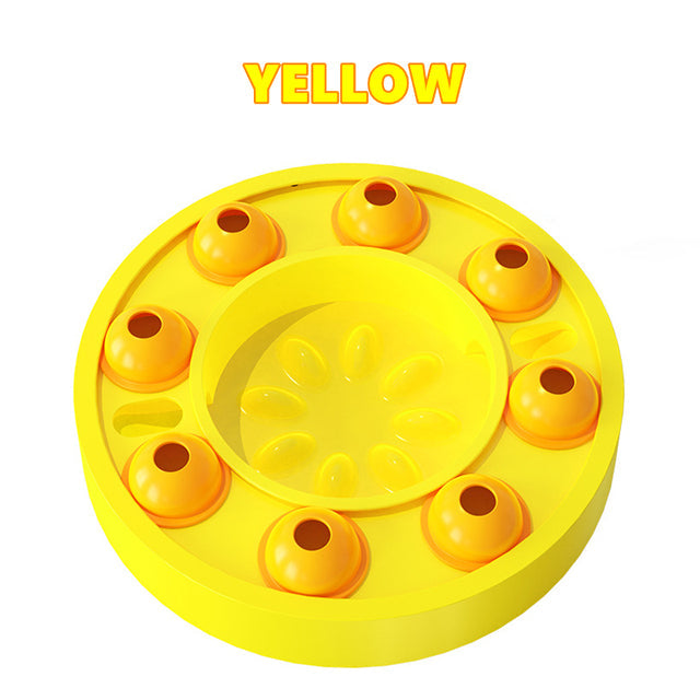 Yellow circular object with raised bumps on a white background