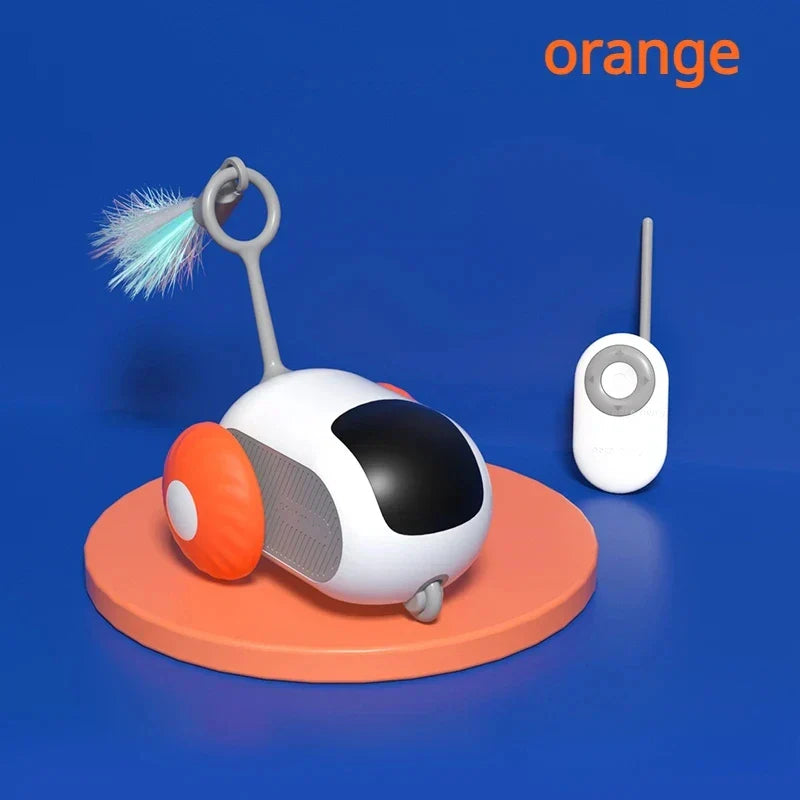 Pet toy with remote control on a blue background, featuring the brand 'orange'.